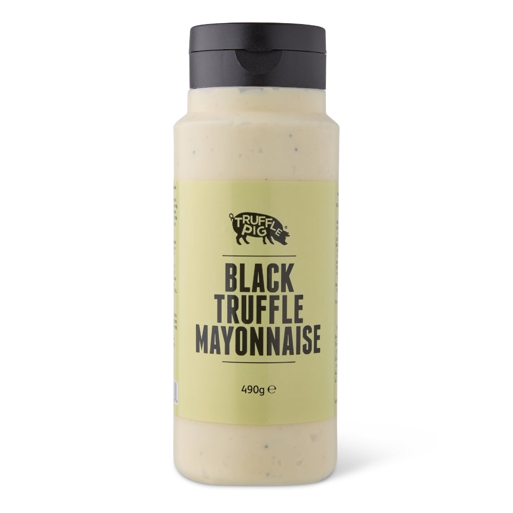 A bottle of Truffle Pig Black Truffle Mayonnaise on a clean white background. The clear bottle shows the mayonnaise inside, with a prominent label and a black cap.