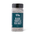 A clear plastic salt jar of Truffle Pig Black Truffle Sea Salt with a black lid and black label, set against a plain white background.