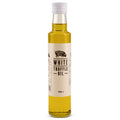 A 250ml glass bottle of White Truffle Oil with a white cap and a cream-colored label featuring a black pig logo and text, set against a plain white background.